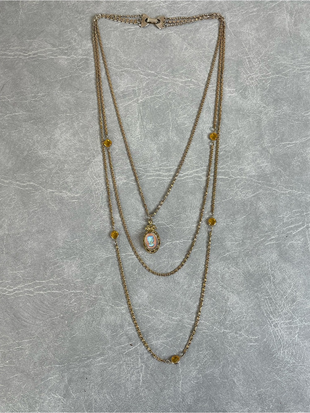 Gold-Tone Multi-Layer Pendant Necklace with “Cameo” and Yellow Gem Accents - Picture 2 of 7